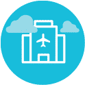 building icon on blue background with clouds