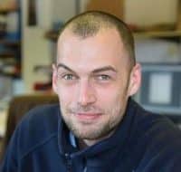 man looking at camera smiling